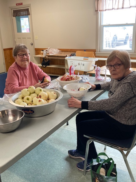Peeling apples for the pies made by St. Mark's Belleville UCW.